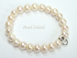 White Roundish Pearl Bracelet with Charm Carrier